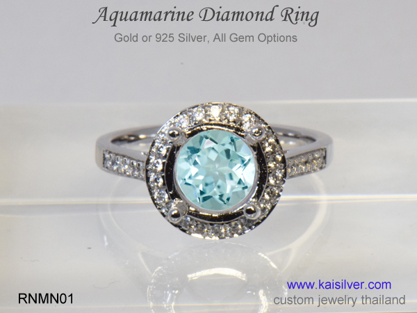 engagement ring with aquamarine